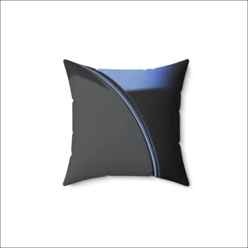 Black decorative pillow with a curved blue accent line.