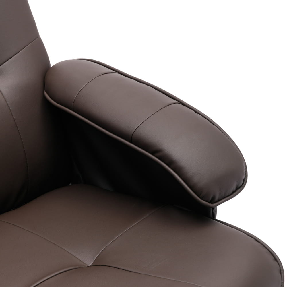 Padded leather armrest of MacArthur’s Merch Recliner Chair in beige and brown.