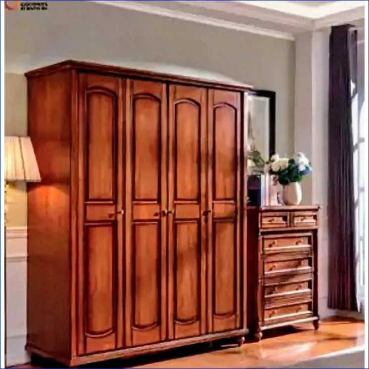 Wooden wardrobe with four doors and decorative panels.