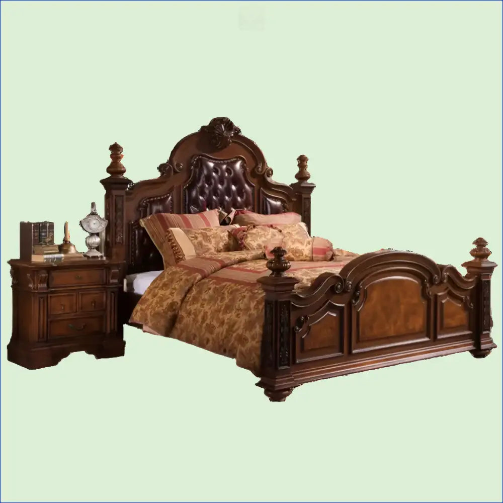 Ornate wooden bed with an intricately carved headboard and footboard.