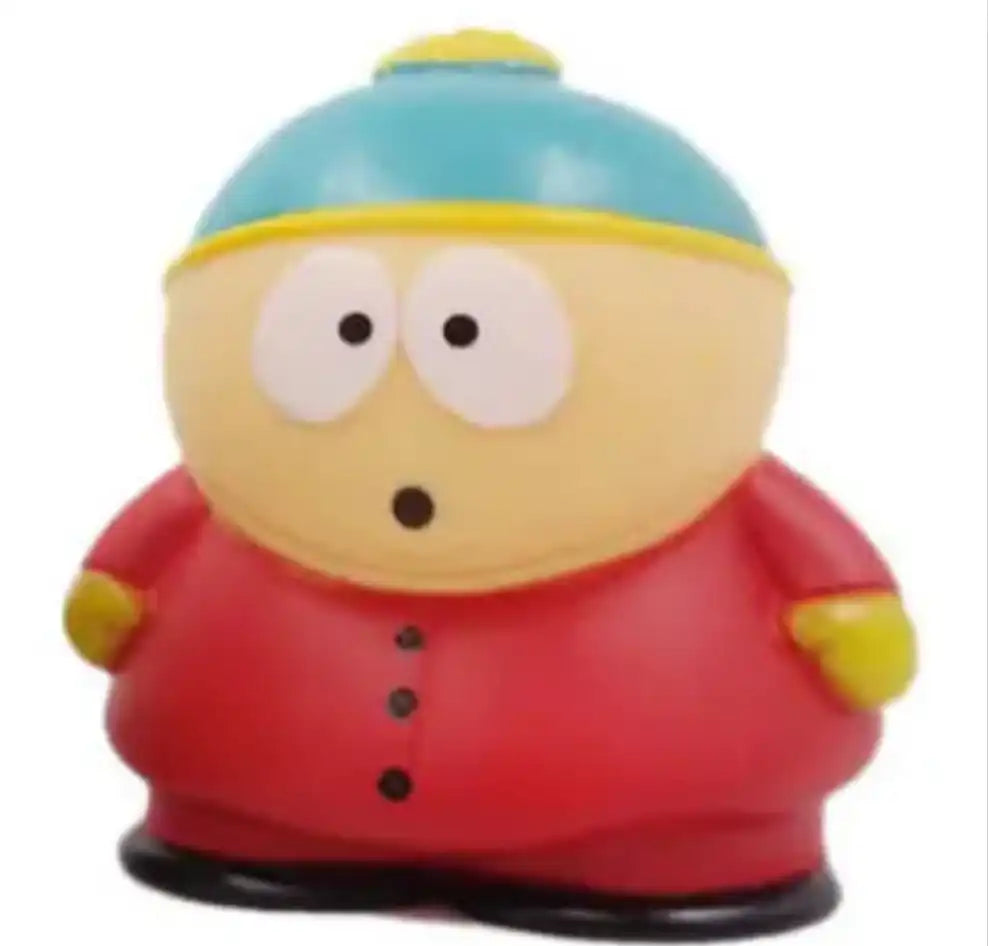 Cartoon character figurine wearing a red coat, blue hat, and yellow gloves.