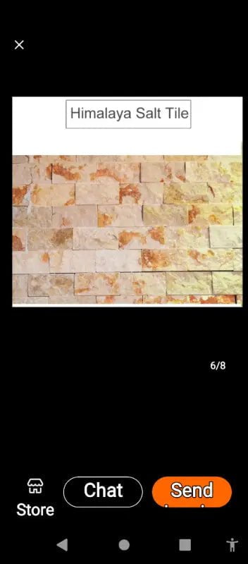 Textured pink and beige Himalayan salt tiles arranged in a stacked pattern.