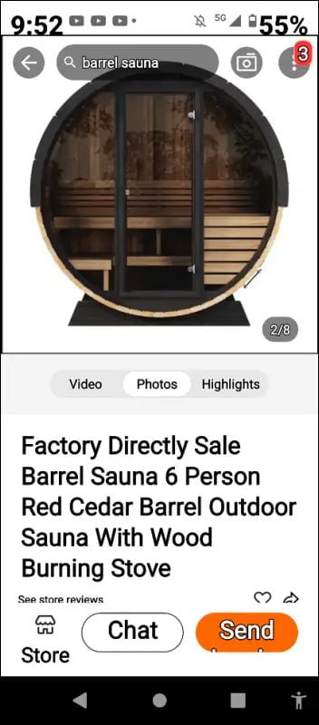 Circular wooden barrel sauna with a glass door and wood-burning stove.