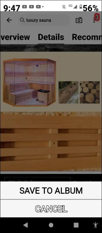 Wooden sauna room with benches and pink lighting.