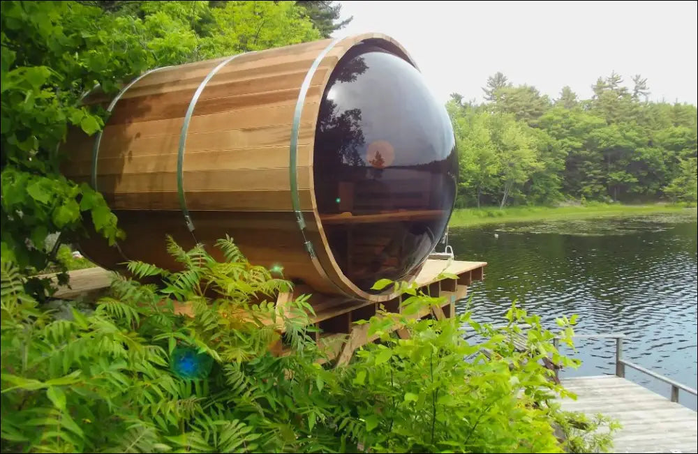 Panoramic view barrel sauna on the lake