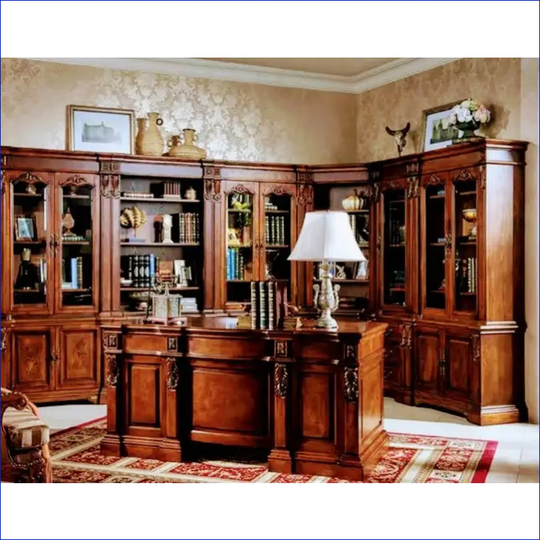 Ornate wooden desk with matching built-in library shelving and cabinets.