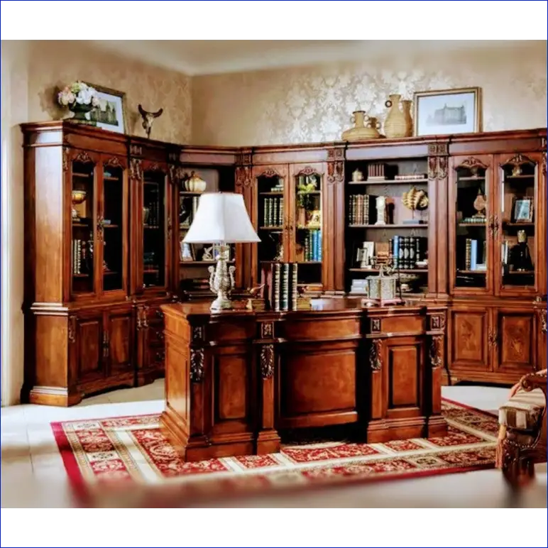 Ornate wooden executive desk with matching built-in bookcases.