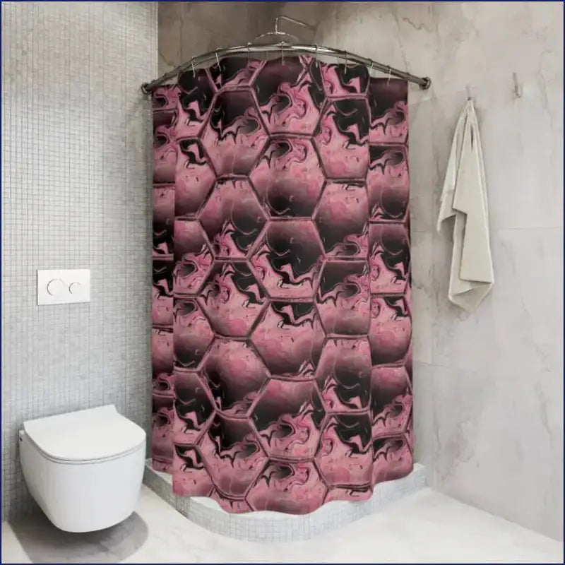 Pink hexagonal-patterned shower curtain with climbing figure silhouettes.