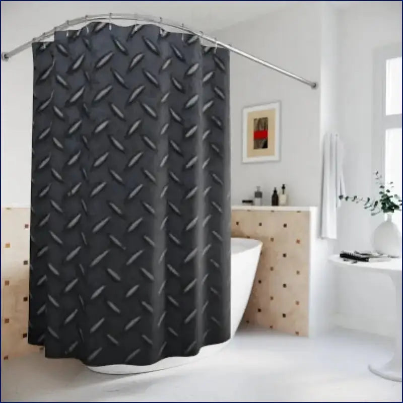 Black shower curtain with an industrial diamond plate pattern.