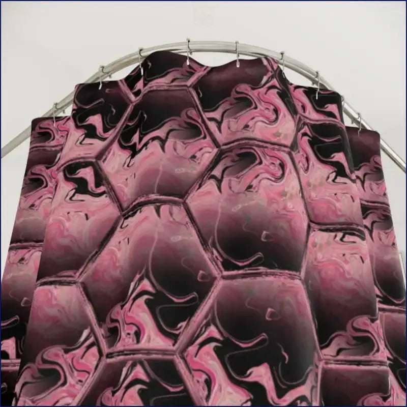 Pink and black marbled hexagonal pattern with a metallic or wet appearance.